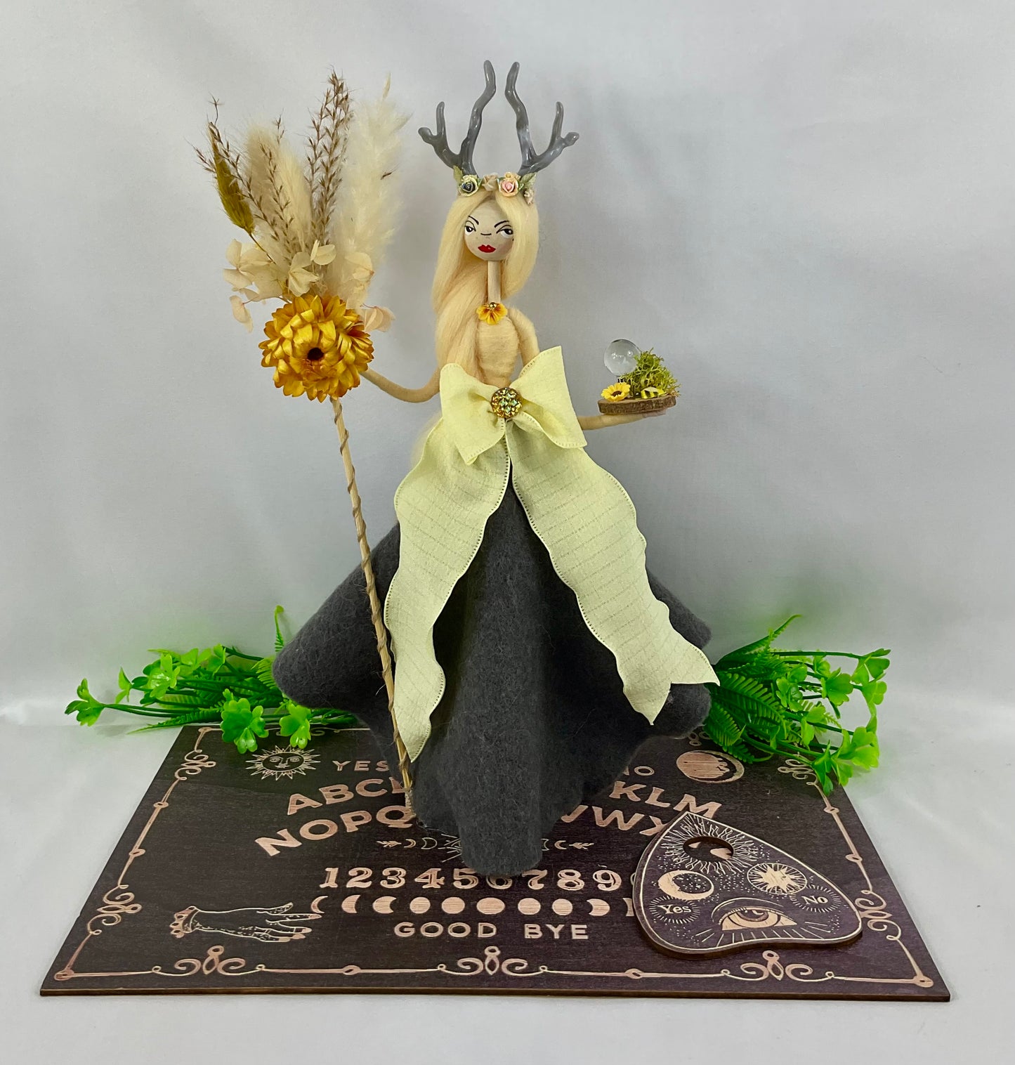 Goddess with ouija board display