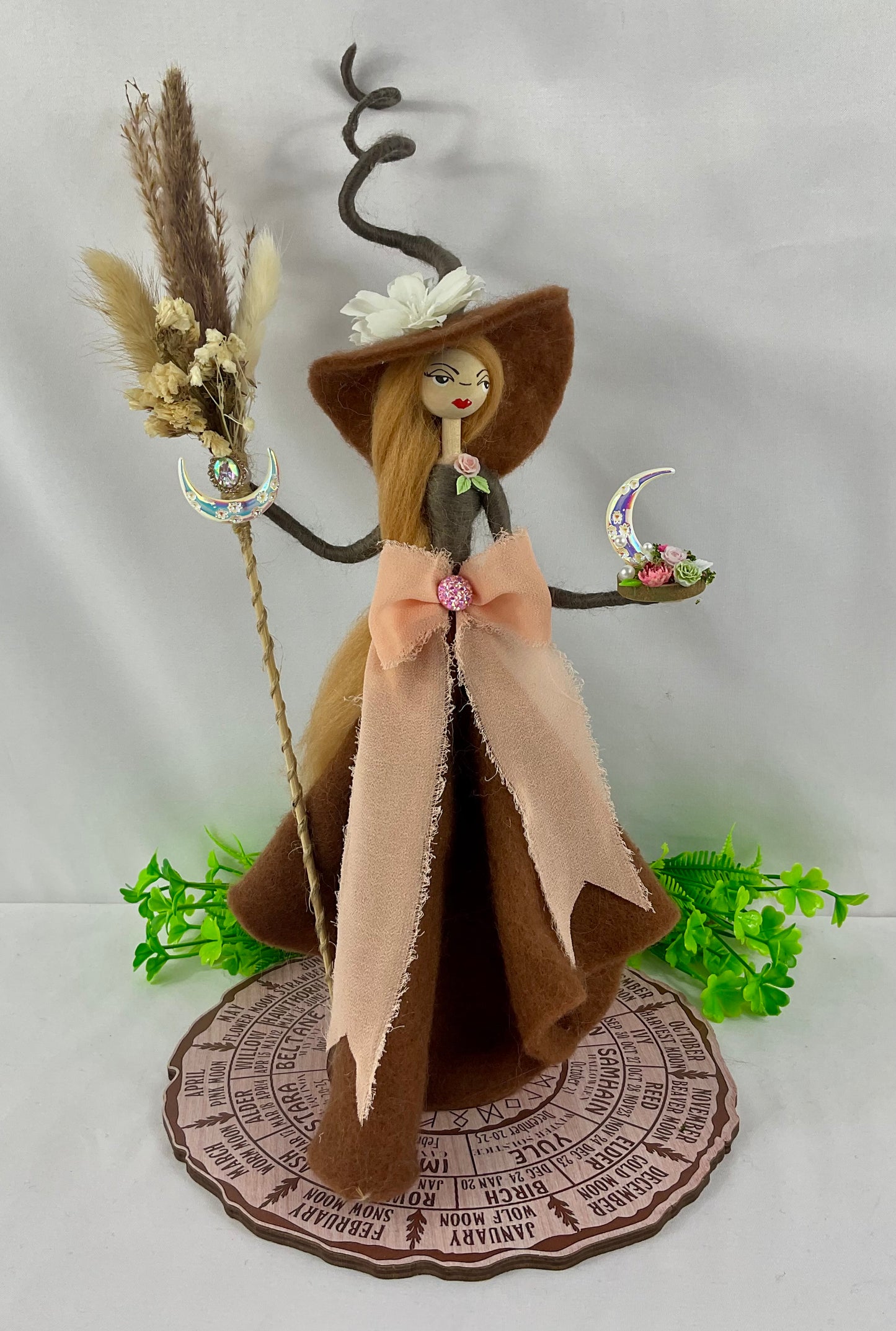Brown witch with display board