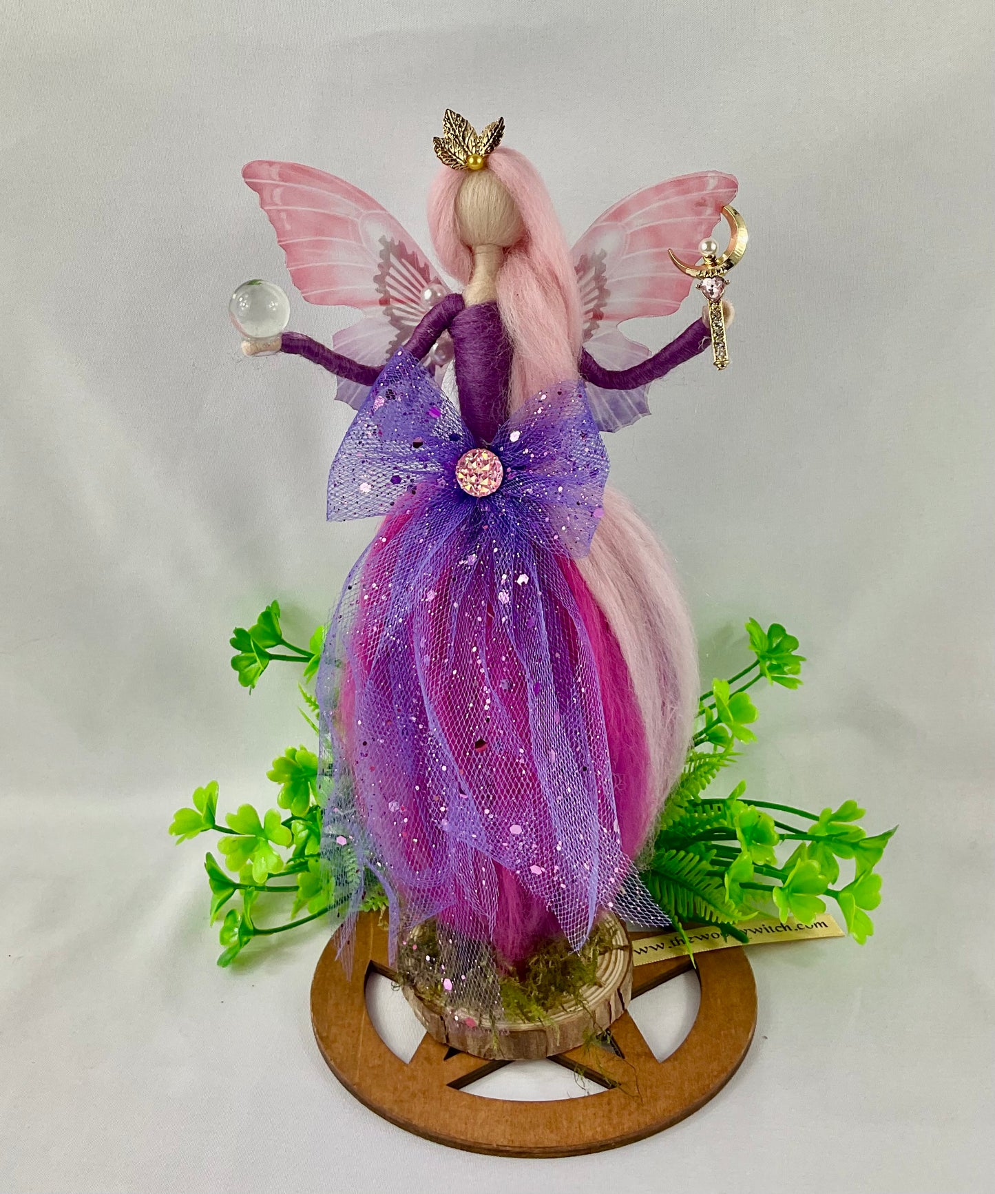 Purple and pink fairy with pentagram display disk