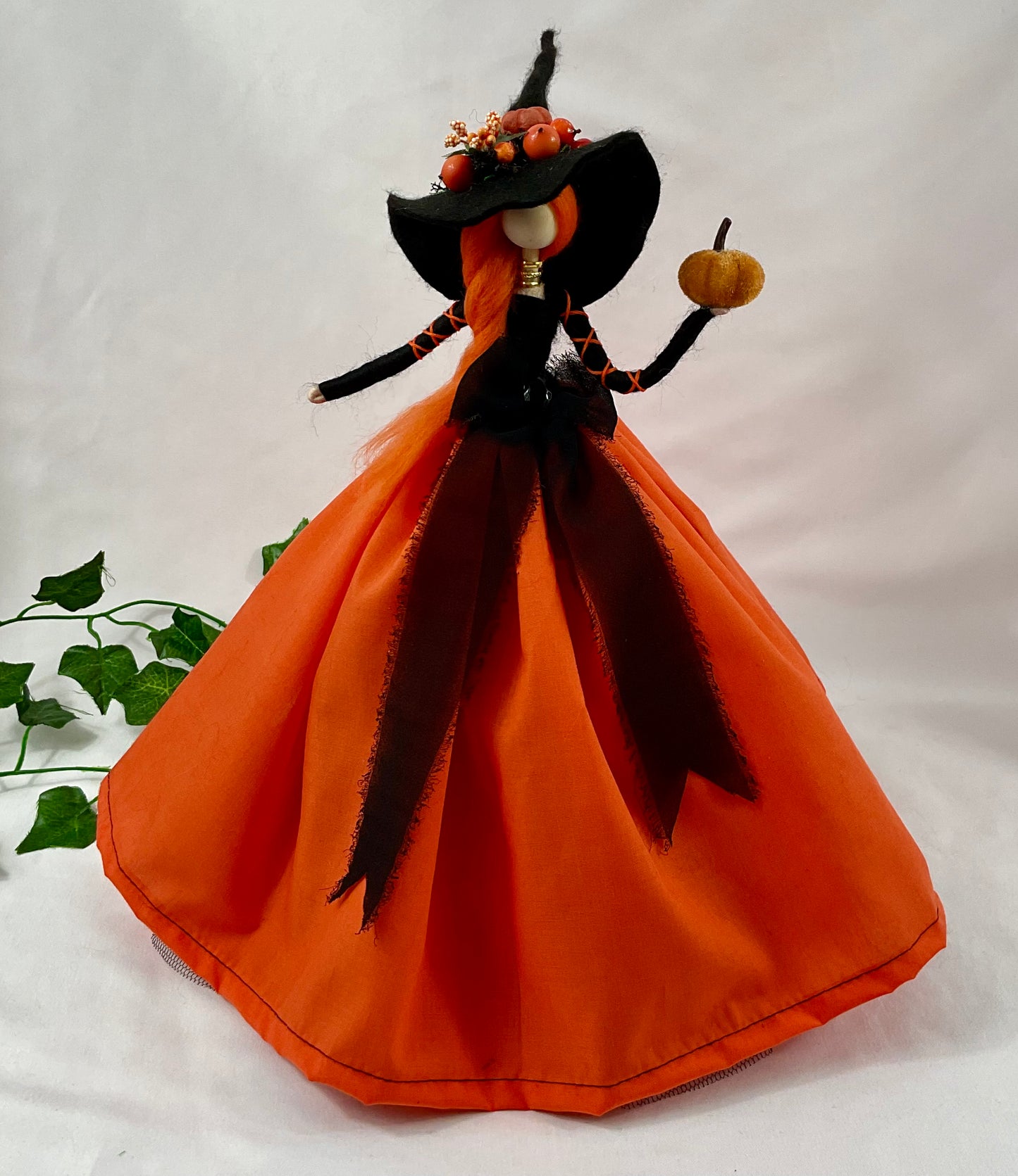 Orange topper witch