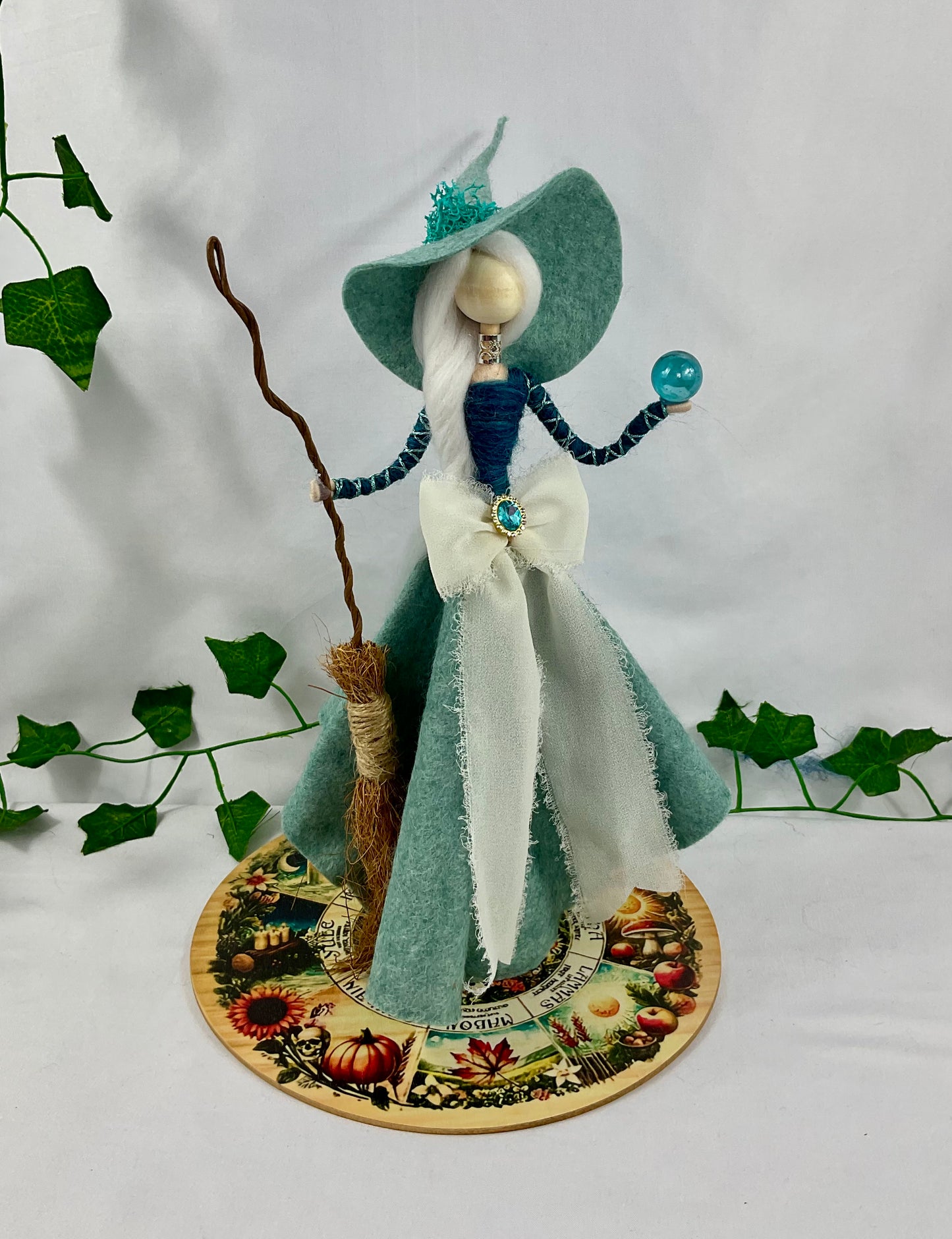 Duck egg blue witch with display disk
