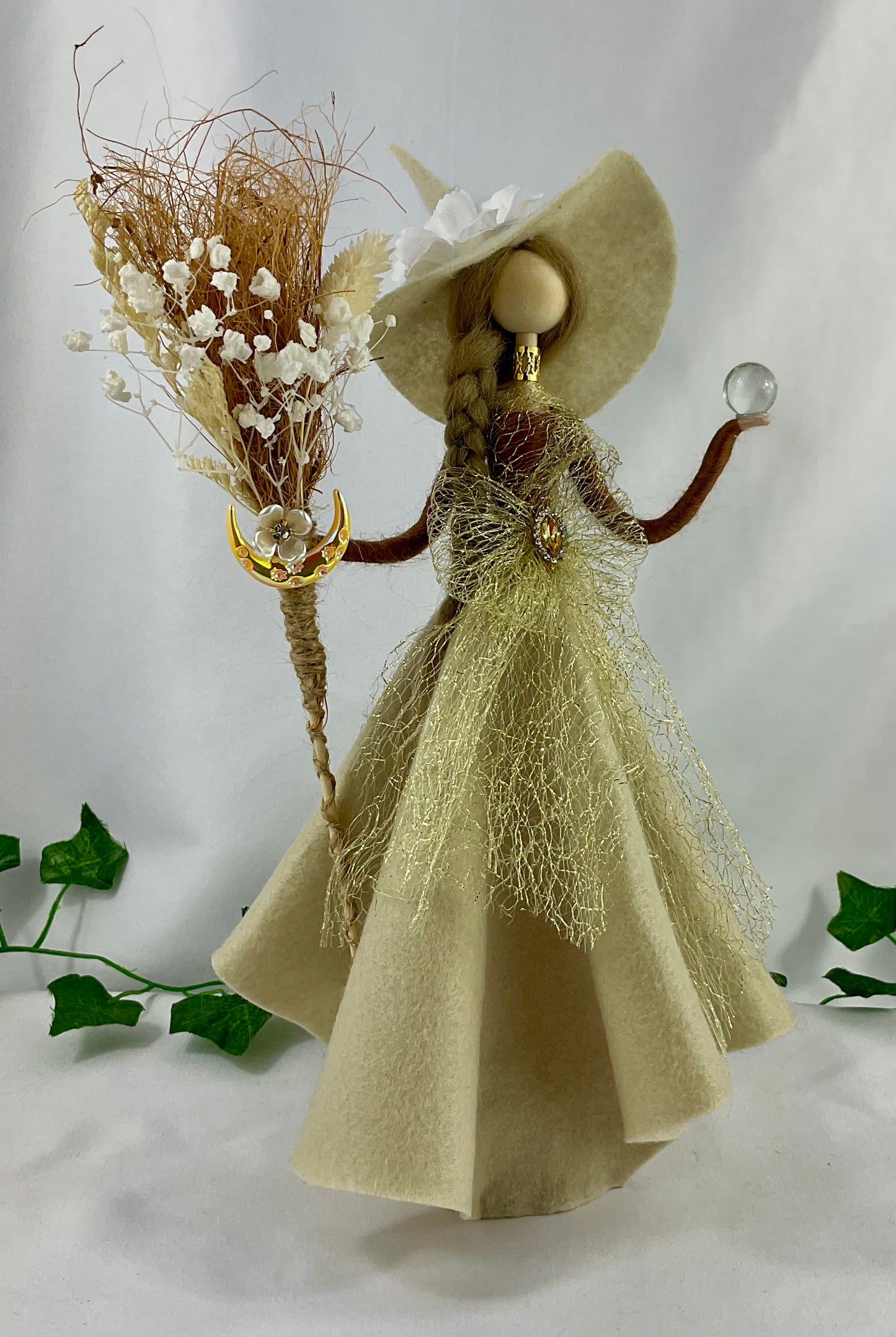 Cream and gold witch