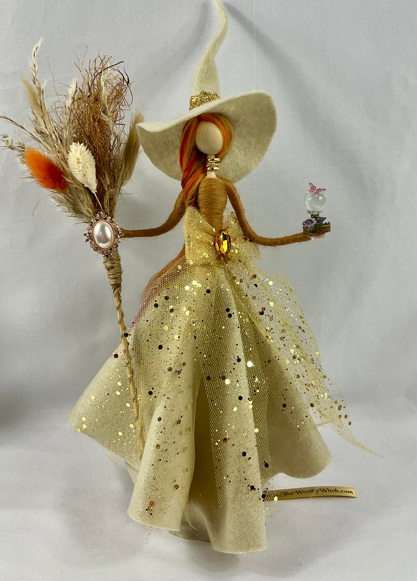 Cream and gold witch