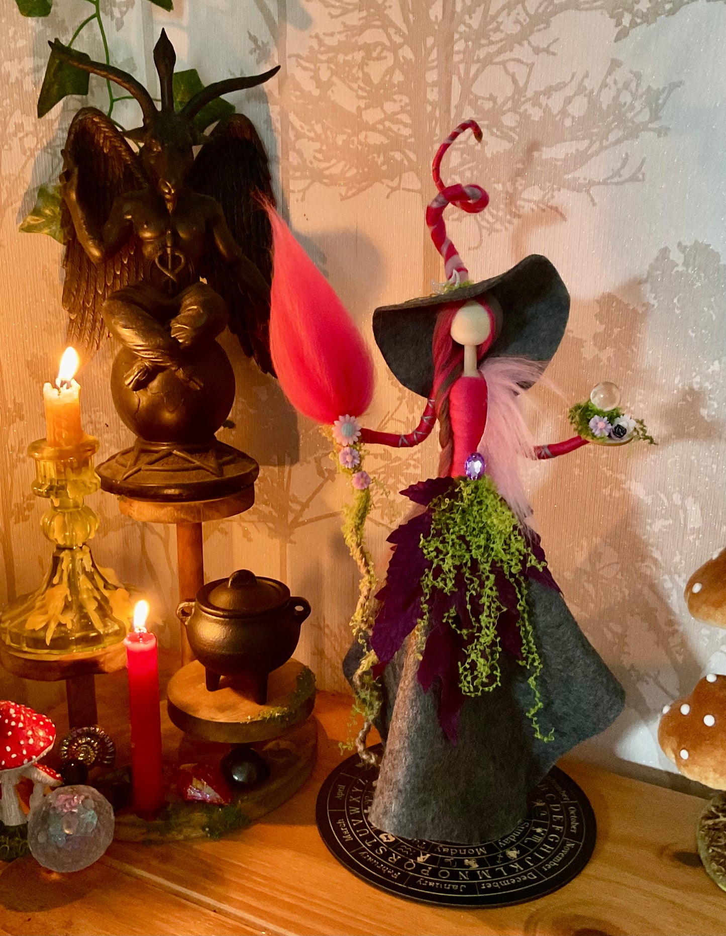 Grey and pink witch with display disk