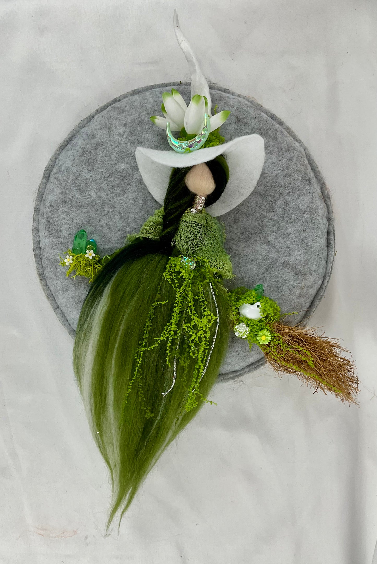 Green flying witch