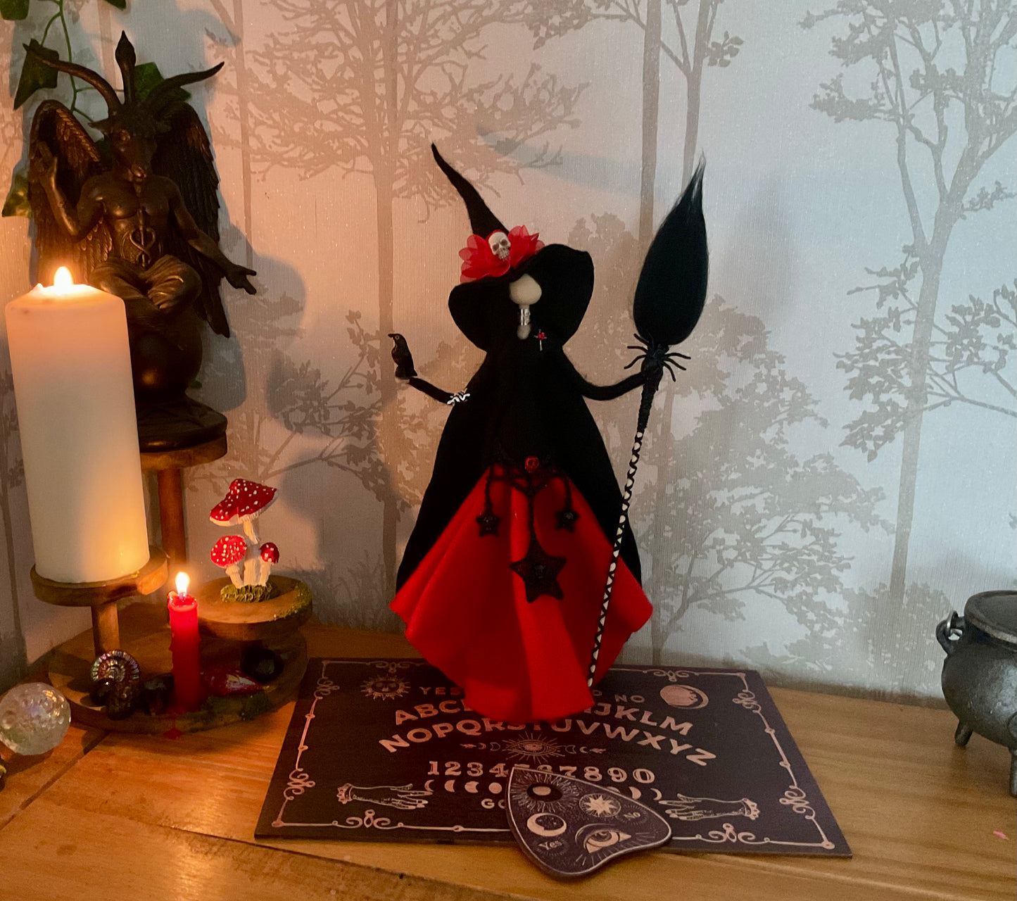 Gothic witch with ouija board