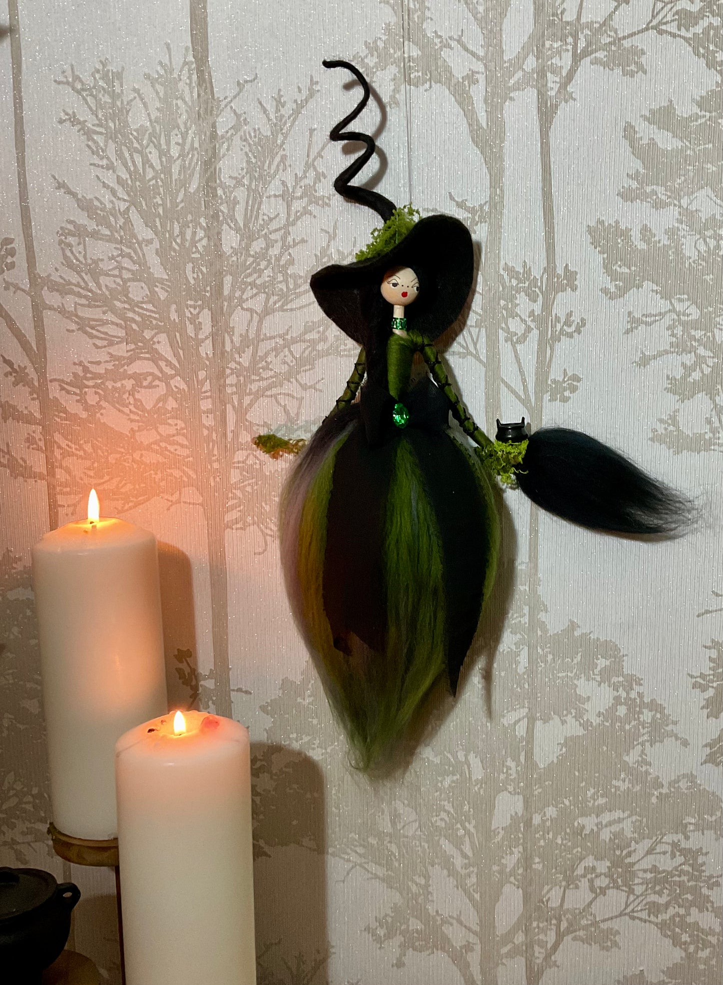 Flying witch in green
