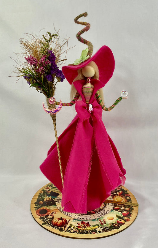 Pink witch with display disk