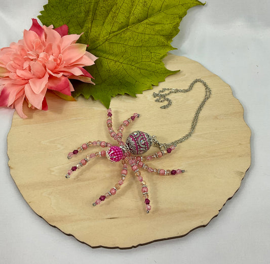 Small pink and silver spider PS3