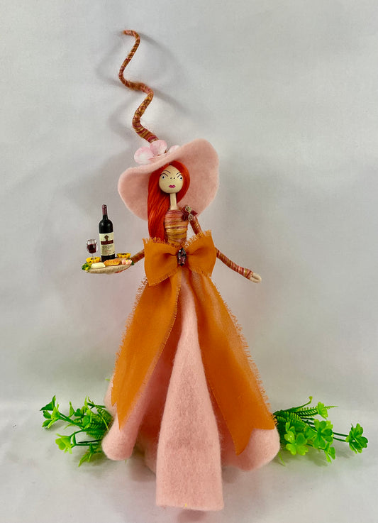 Pink witch with wine