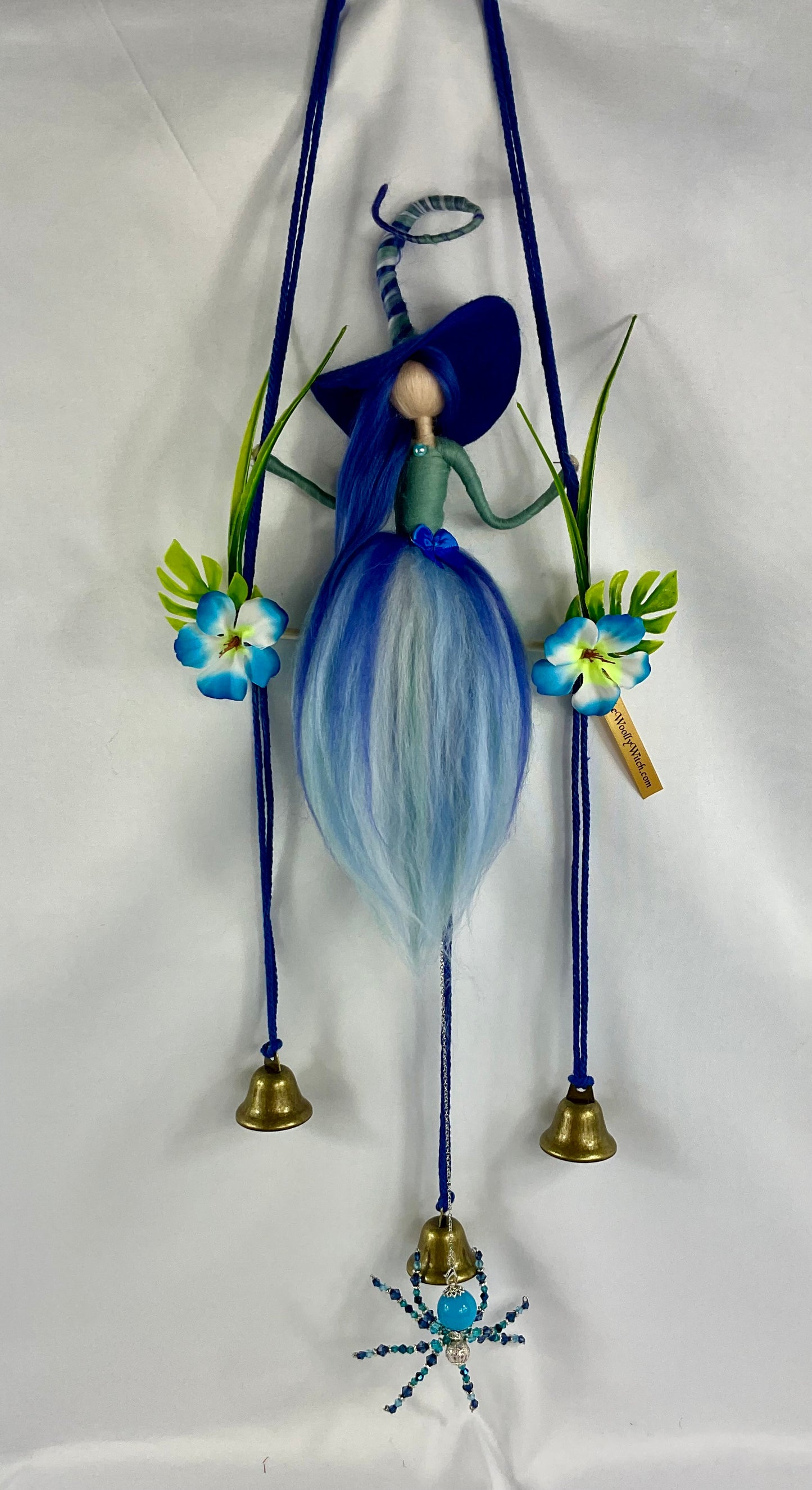 Teal and blue woolly witch bells with detachable beaded spider