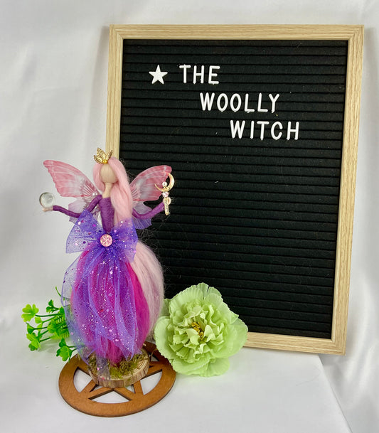 Purple and pink fairy with pentagram display disk