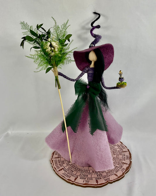 Purple and Green witch with bouquet broom