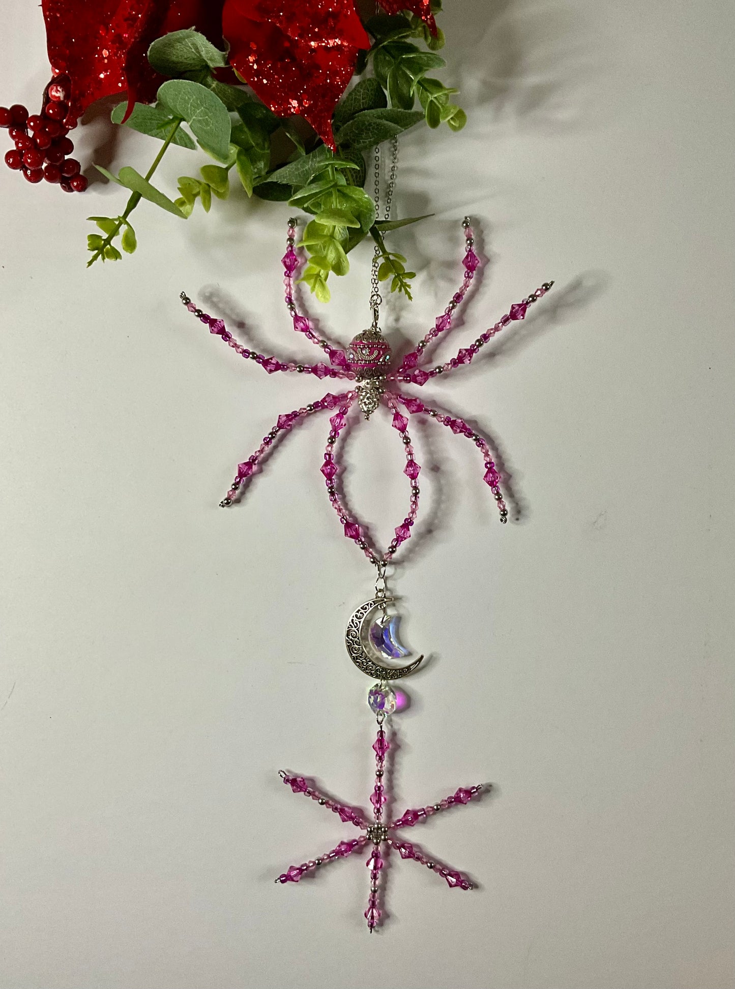 Pink and silver snow flake spider