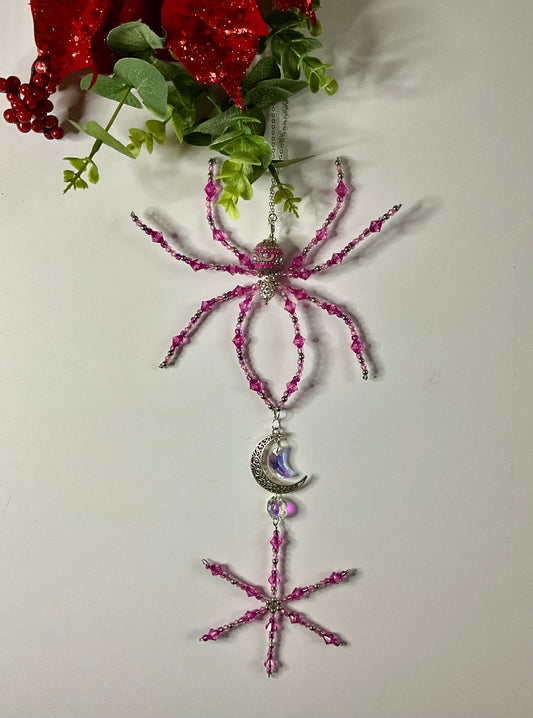 Pink and silver snow flake spider