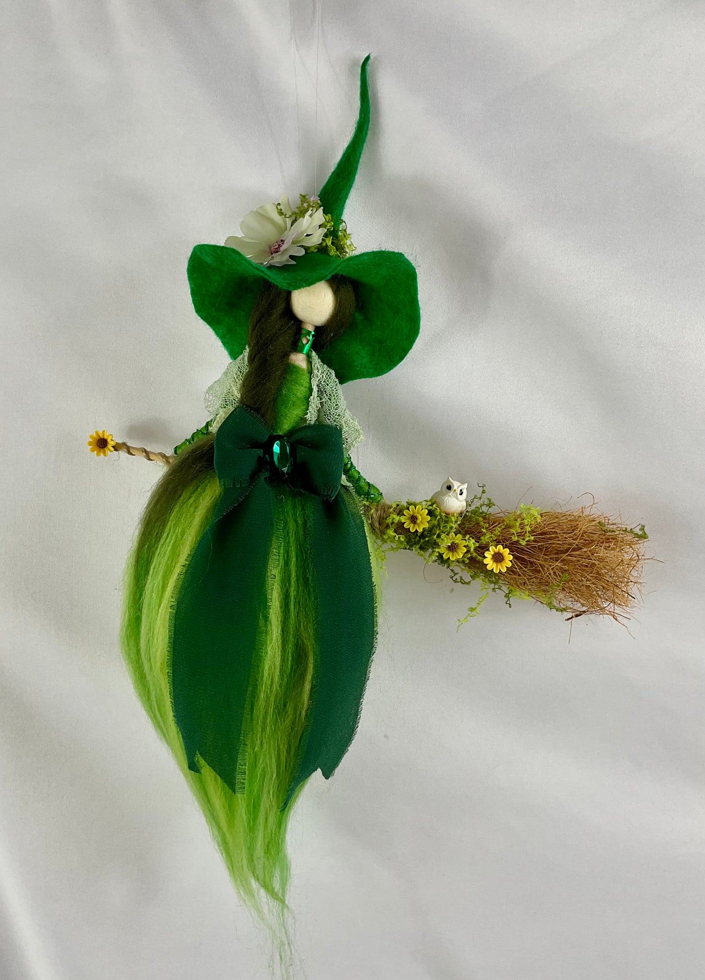 Green flying witch