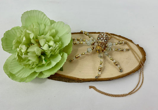 Clear and gold beaded spider CG91