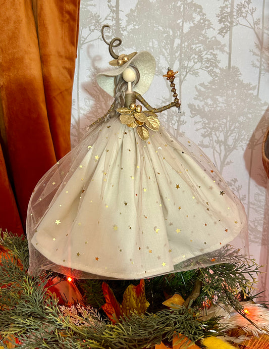 Cream and gold witch topper