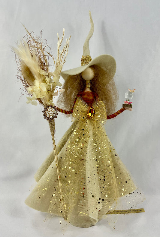 Cream and gold witch