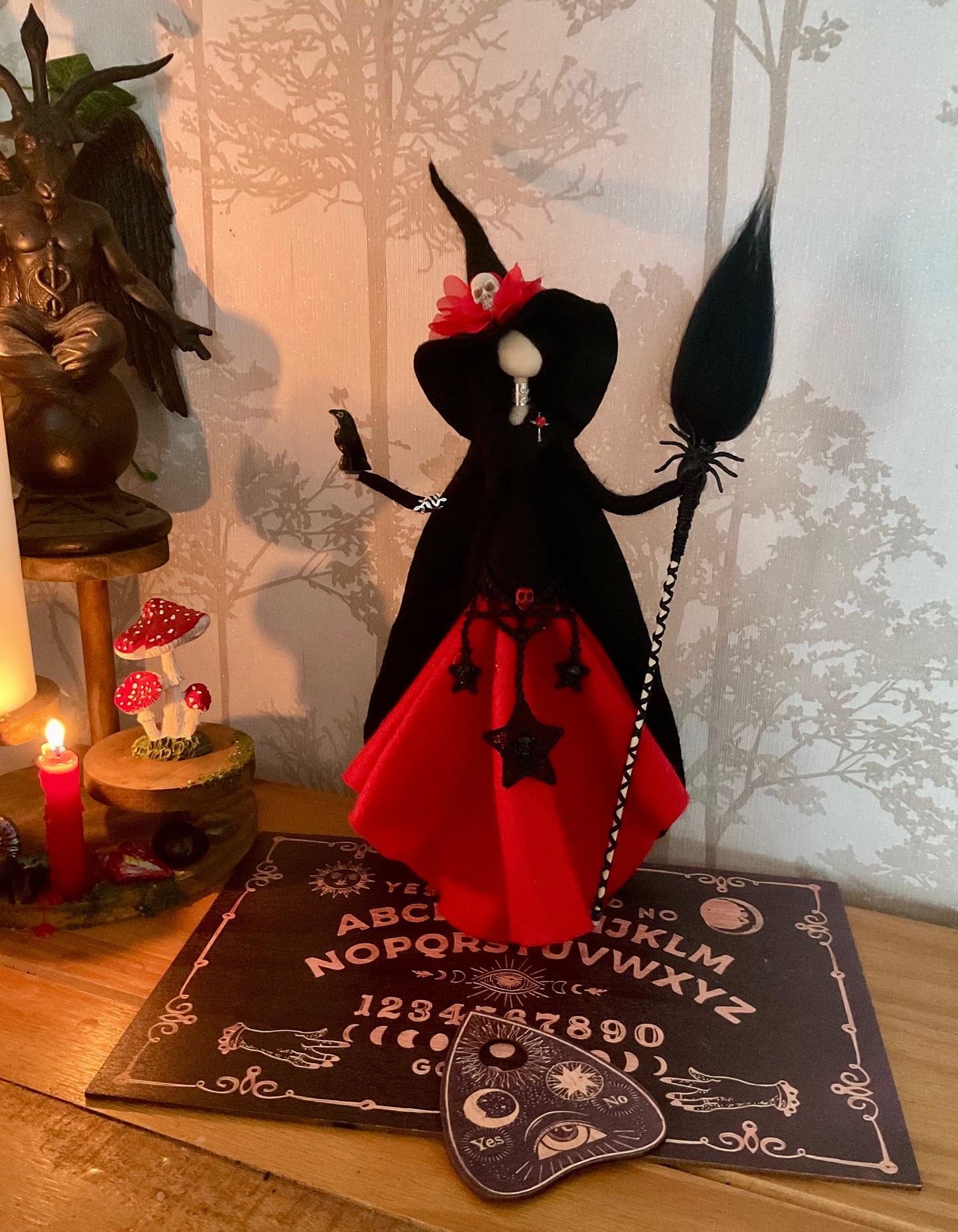 Gothic witch with ouija board