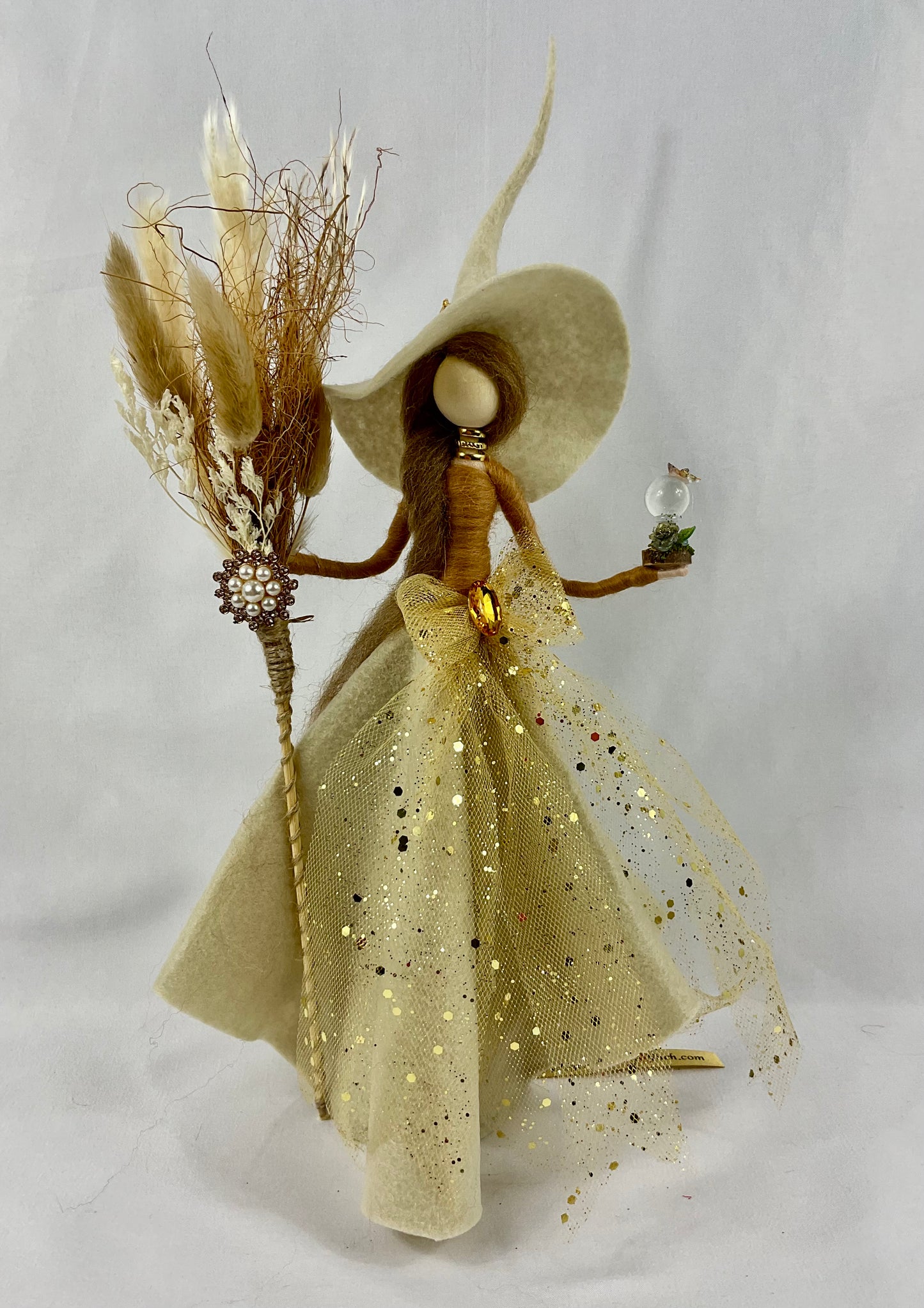 Cream and gold witch