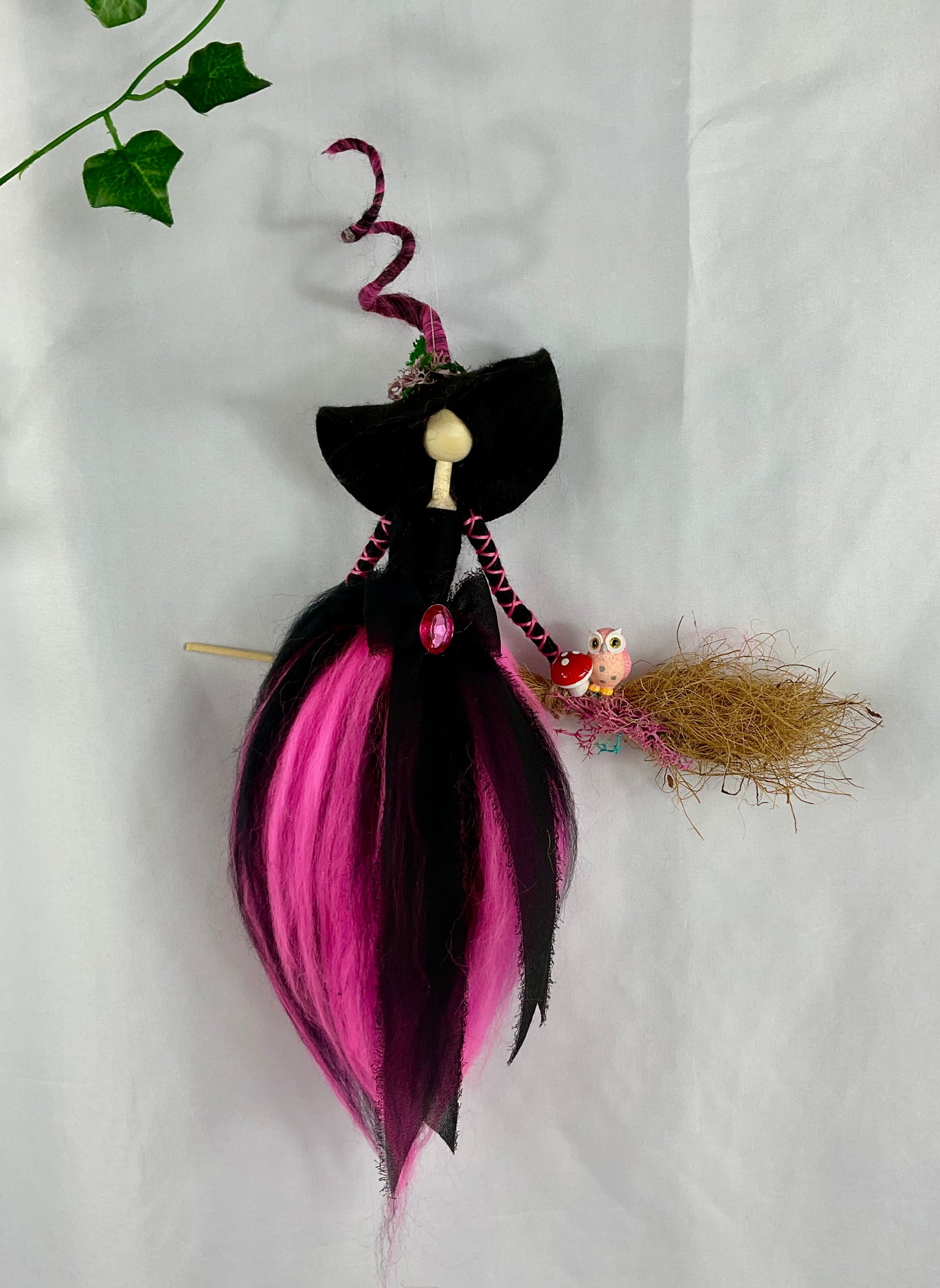 Black and pink flying witch