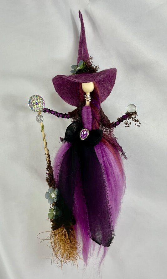 Purple flying witch