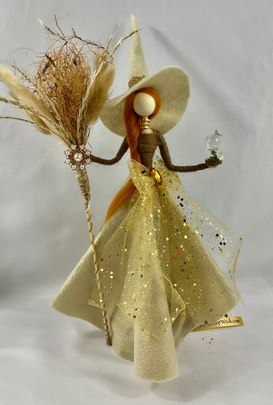 Cream and gold witch