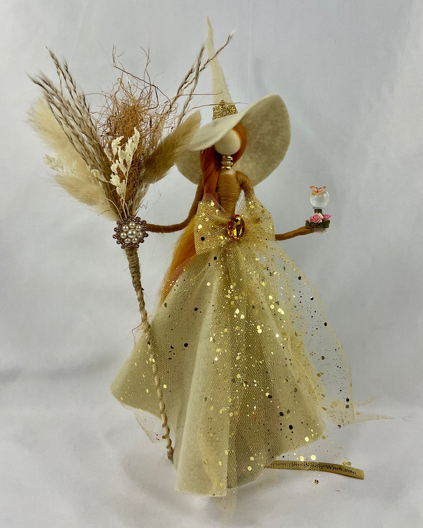 Cream and gold witch