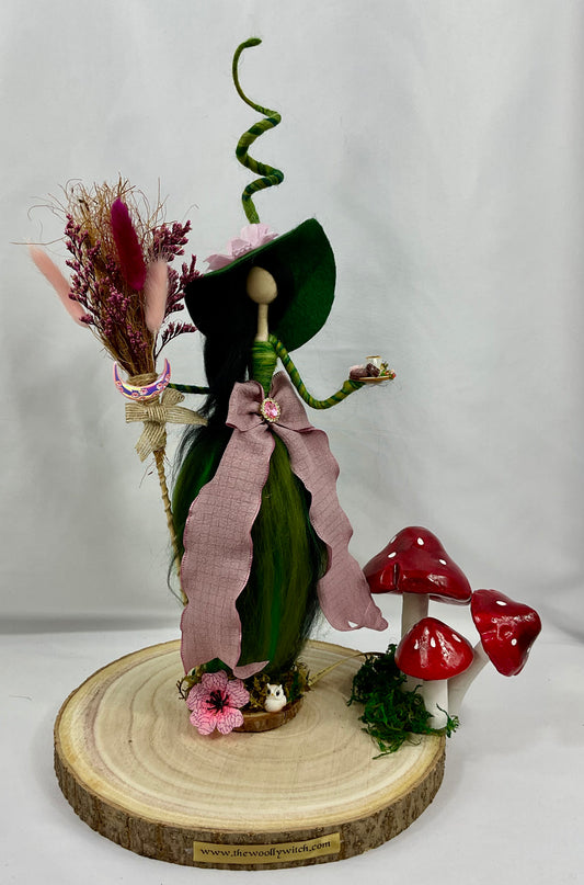 Green and pink witch
