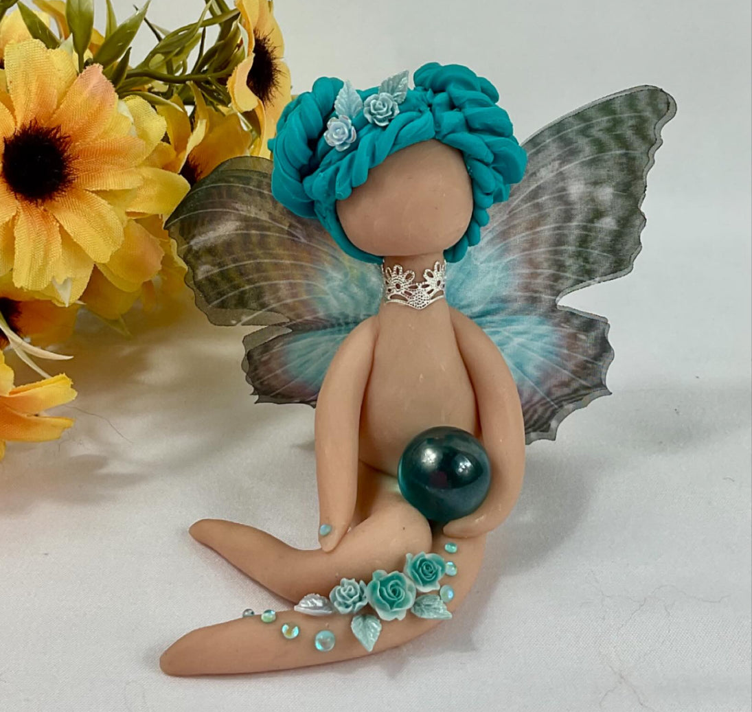 Blue butterfly winged fairy