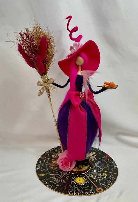 Pink witch with display disk