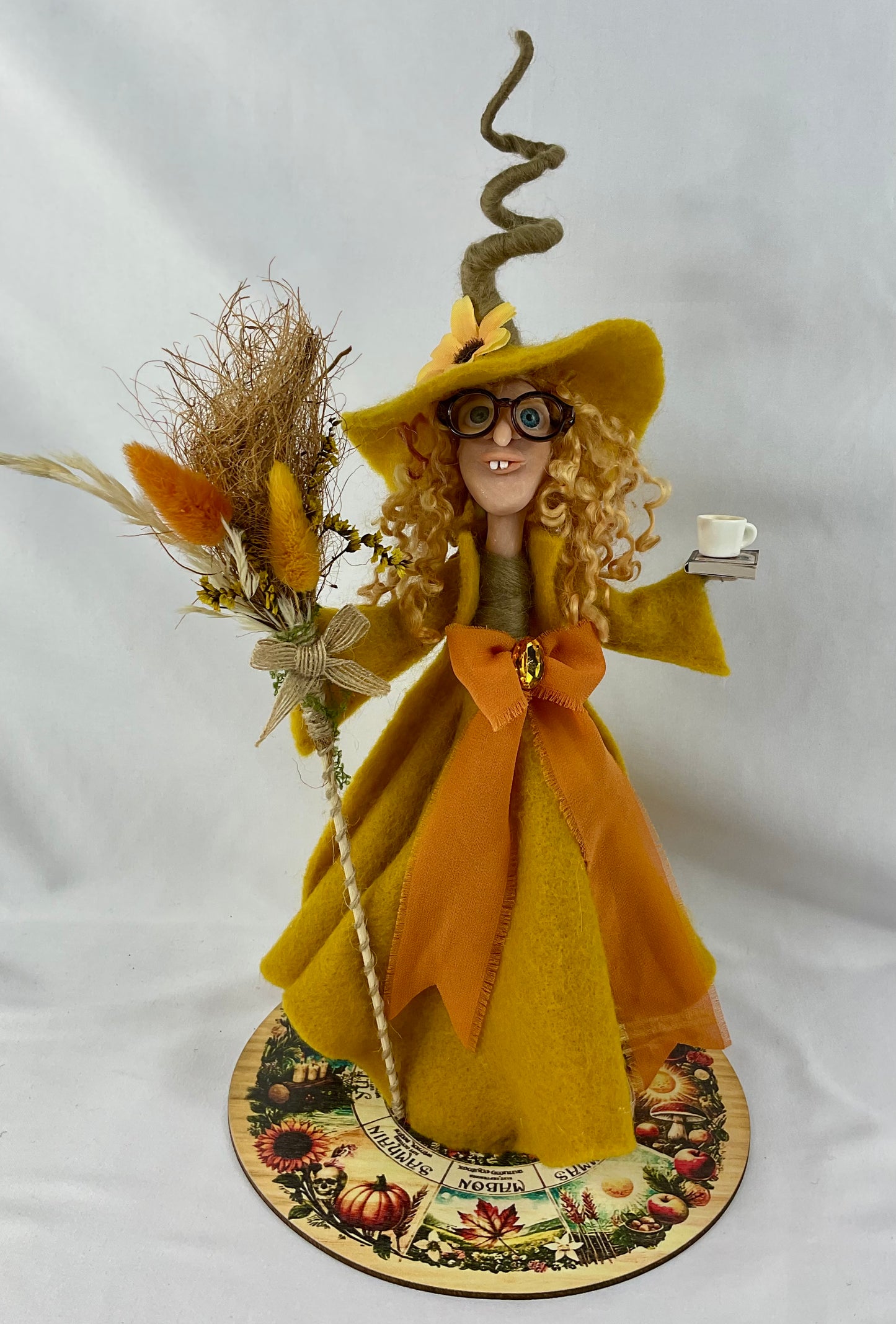 Tess Paige-Turner, reading witch with display disk
