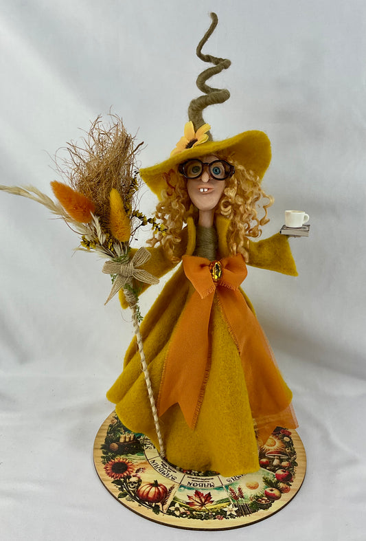 Tess Paige-Turner, reading witch with display disk