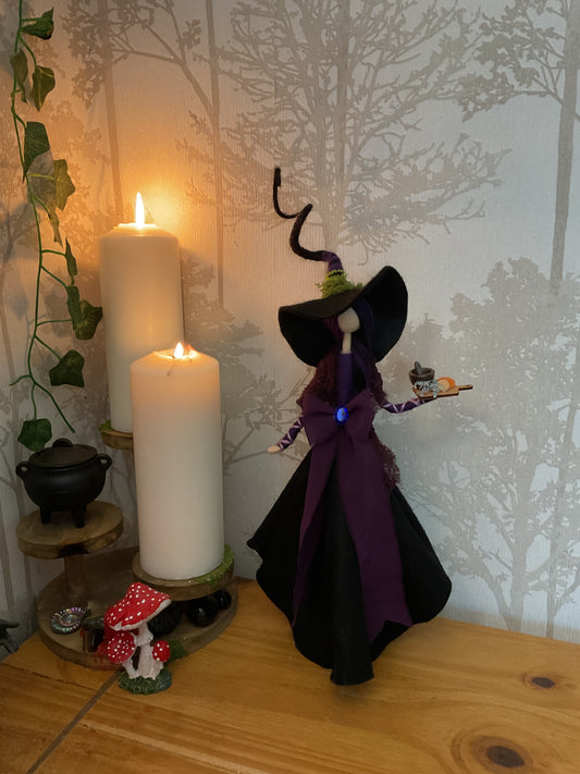 Black and purple standing witch